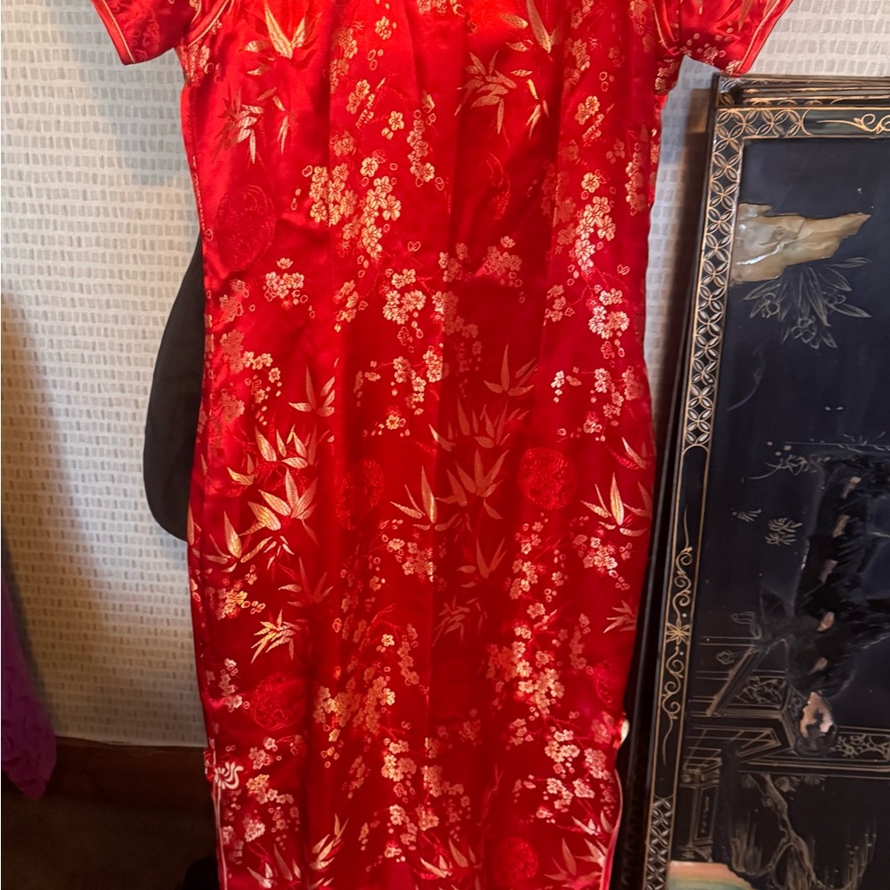 Vibrant Red Dress with Gold Accents